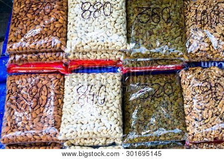 Nuts, Dry Fruits And Pulses Packed In Clear Plastic Bags With Prices