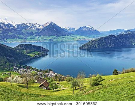 View Of Lake Lucerne Or Vierwaldstaetersee With Vitznau Settlement And Swiss Alps In The Background 