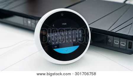 Paris, France - Apr 28, 2019: Installation Of New Amazon Echo With Personal Assistant Alexa With Lar