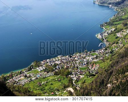 View Of The Vitznau Settlement On The Shore Of Lake Lucerne Or Vierwaldstaetersee From The Top Of Vi