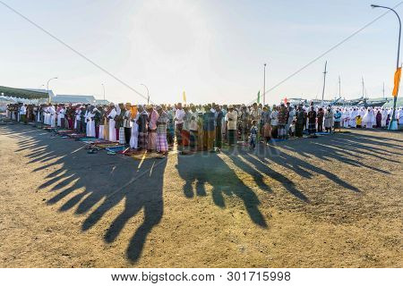 Flores/indonesia-july 28 2014: Muslims Pray To Celebrating Eid Al-fitr Which Marks The End Of The Mo