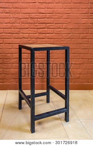 Loft Wooden Furniture On Brick Wall Background