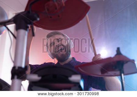 Drums, Music And People Concept - Emotional Man Playing On Elecronic Drums, Its His Hobby