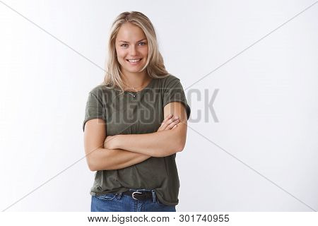 Try Bit My Record. Portrait Of Self-assured Cheeky Young Blond Caucasian Female In Olive T-shirt Cro