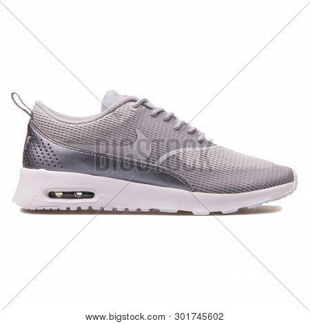 Vienna, Austria - August 10, 2017: Nike Air Max Thea Txt Metallic Grey Sneaker On White Background.