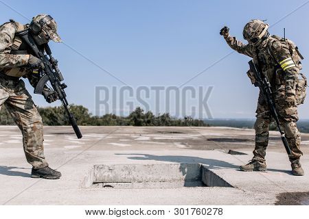 Military With Sniper Rifles Storming The Building Standing On The Roof