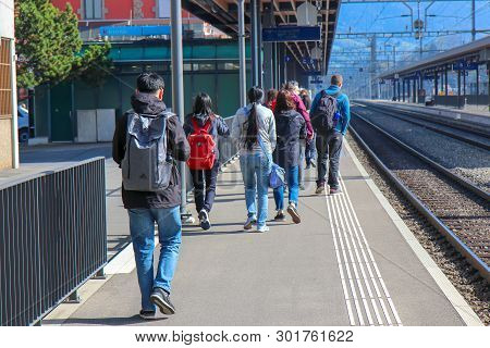 Lucerne, Switzerland - Oct 18, 2018: Tourists Are Walking To The Arth-rigi-bahn Is Standard-gauge Ra