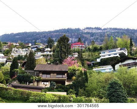 The Vitznau Village On The Slopes Of The Mountain And The Summit Of Vitznauerstock - Canton Of Lucer