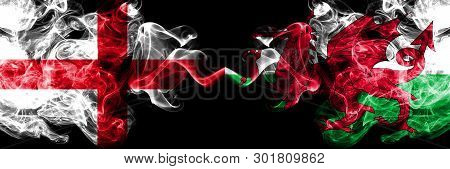 English Vs Wales, Welsh Smoky Mystic Flags Placed Side By Side. Thick Colored Silky Smokes Flag Of E