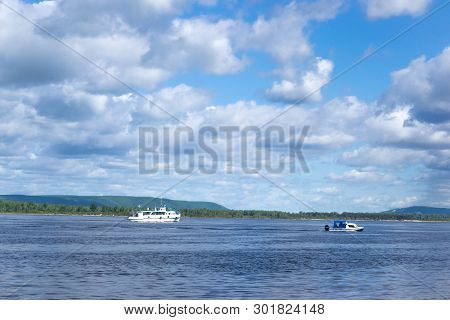 The Boat Floats On The River, Clouds In The Sky.