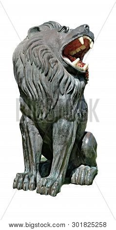Statue Of A Lion With Strawberries In The Mouth In Full Size. Located At The Playground Of The City 