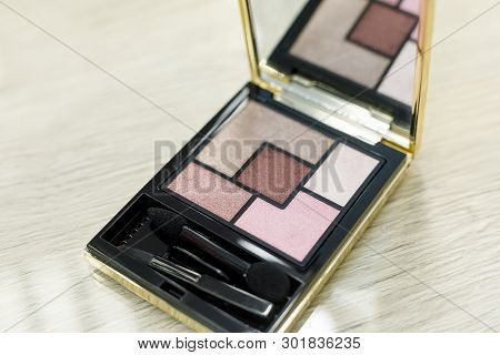Palette With Shadows On The Table In The Beauty Salon