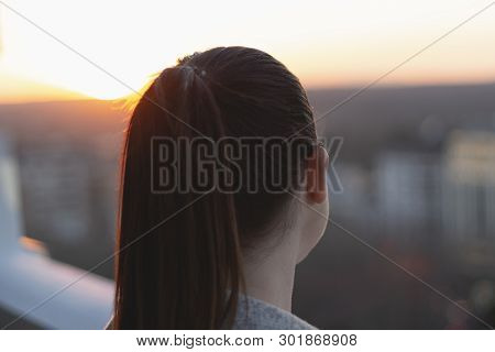 Girl Enjoying The Sunset
