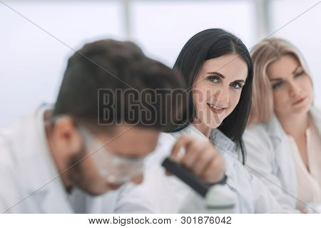 Close Up.modern Woman Scientist In The Workplace In The Laboratory.