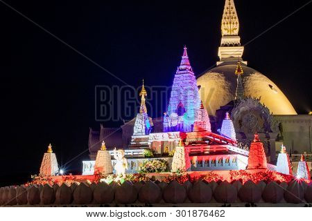 Architecture Of Wat Bunglatthiwan In Ayutthaya, Thailand On Vesak Day With Colour Light Decor Around