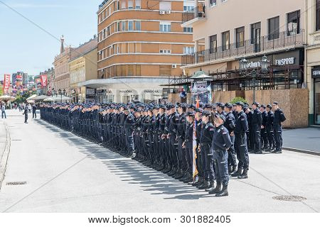 Novi Sad, Serbia. May - 19. 2019. The Final Class Of Young Serbian Policemen Standing In A Line In T