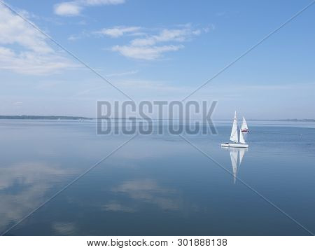 Goczalkowice, Poland On May 2019: Two White Yachts On Landscapes Of Artificial European Reservoir Wi