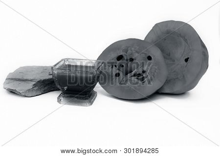 Papaya Face Pack Isolated On White I.e. Papaya Pulp Well Mixed With Multani Mitti Or Fuller's Earth 