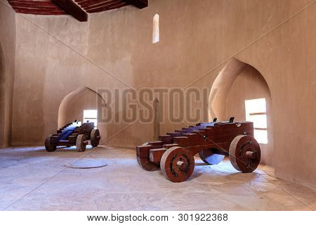 Rustaq, Oman, May 28, 2016: cannon carriages in a tower in Rustaq Fort, Oman