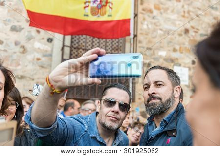 Caceres, Extremadura, Spain - May 18, 2019: Attendees At The Vox Rally Make Selfies With The Leader 