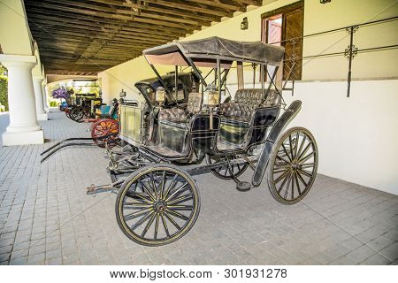 Talagante, Chile - Dec 29, 2018: Old coaches in winery Vina Undurraga in Talagante , Chile.  The foundation was established in 1885 by Don Francisco Undurraga.