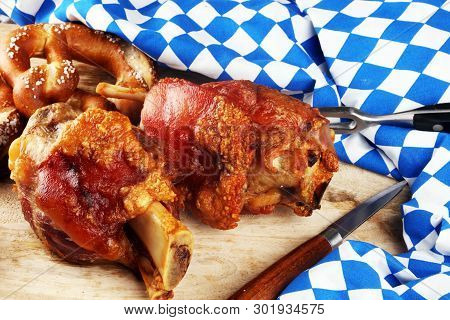 Traditional German Cuisine, Schweinshaxe Roasted Ham Hock And Pretzels