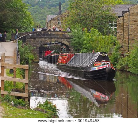 Hebden Bridge, West Yorkshire, England - 19 May 2019: Vintage Boats Traveling To The Historic Narrow