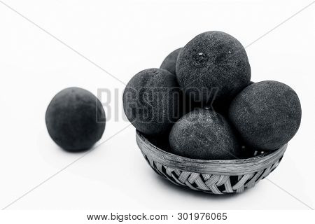 Raw Chikoo Or Sapodilla Isolated On White In A Basket.