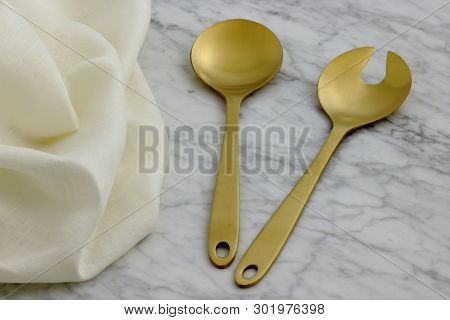 Beautiful Golden Serving Spoon And Fork