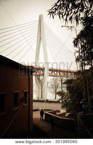 Dongshuimen Bridge viewed from Xiahao Old street in Chongqing, China.