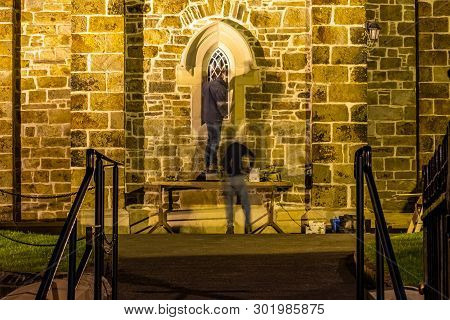 Men Are Reapiring Historic Church Window In Donegal Town - Ireland