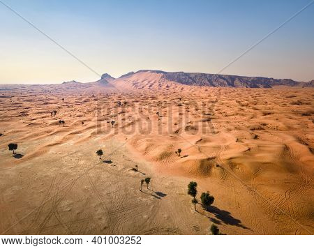 Scenic Fossil Rock In The Sharjah Desert Of The United Arab Emirates Aerial View. Sand Meeting The R