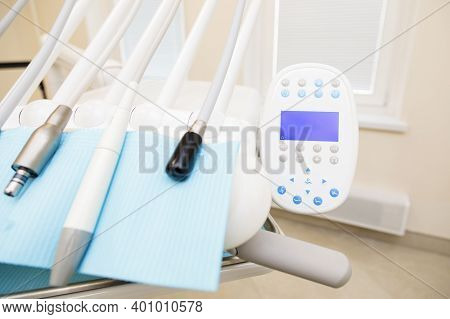 Interior Of The Dental Office With A Chair And Tools For Dental Treatment.