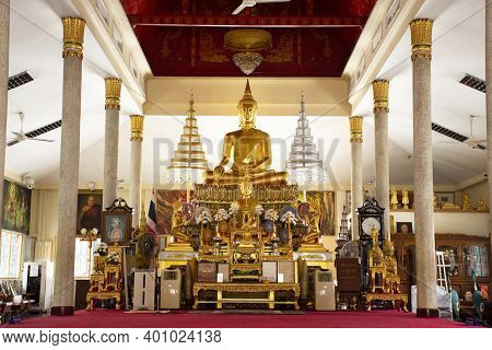 Gold Buddha Statue In Ubosot Or Church Of Wat Amphawan Temple For Thai People And Foreign Travelers 