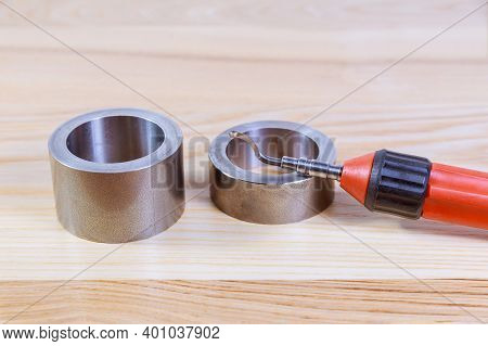 Deburring Tool For Metal, Wood, Aluminum, Copper And Plastic Isolated On White Background.