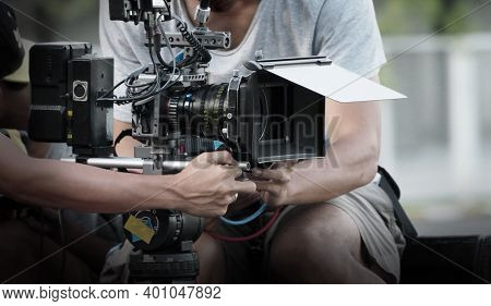 Film Industry. Filming With Professional Camera. Videographer Holding 4k Cam On Dslr Rig Or Gimbal S