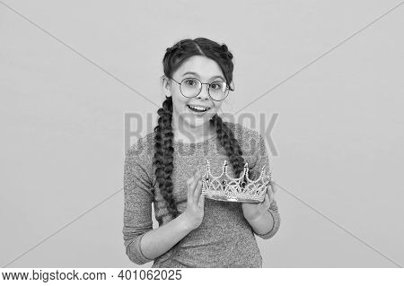 Cute Adorable Girl In Glasses. Princess Concept. Happy Smiling Princess. Excellent Pupil. Success An