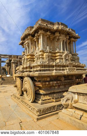 Hampi, India on December 31, 2018 :World heritage site historic Vijaya Vittala temple and Hampi runes in India