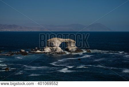 Natural Arch Rock Formation La Portada In Pacific Ocean Near Coast Of Antofagasta In Chile South Ame