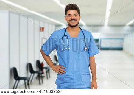 Doctor With Beard At Vaccination Station Is Ready For Vacinating Patients Against Coronavirus Infect