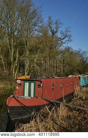 Bath, Somerset, United Kingdom - December 27, 2020: Narrowboats Illuminated By The Early Morning Win