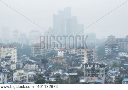 Weathered Buildings And Apartments On A Foggy Rainy Day On Shang Xia Jiu Pedestrian Street  In The X