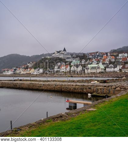 An Empty Marina In The Winter. Mountains In Fog In The Background. Picture From Molle, Scania County