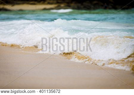 Powerful, Stormy, Foamy Waves Are Picked Up By The Wind. White Foam From Bubbles Of Different Sizes 