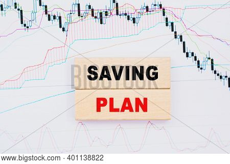 Word Saving Plan . Wooden Small Cubes With Letters With Copy Space Available. Business Concept Image