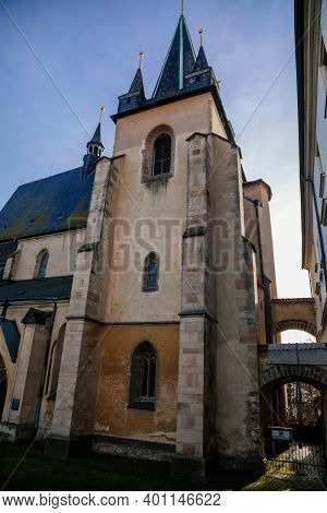 Gothic Church Of Saint Gothard With Bell Towers In Old Historic Center Of Medieval Royal Town Slany 