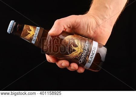 Lviv, Ukraine - December 15, 2020: Grimbergen Beer In Hand