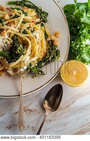Linguine Pasta With Italian Sausage Chickpeas And Broccolini In A Creamy Ricotta Cheese Sauce