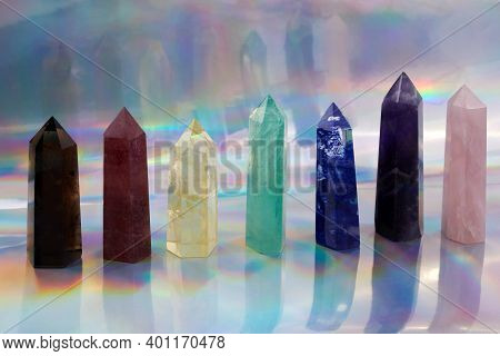 Healing Chakra Crystals On Halographic Background. Meditation, Reiki Or Spiritual Healing Background