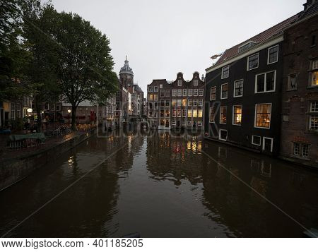 Typical Amsterdam Architecture Style Buildings Houses Grachten Canal At Oudezijds Voorburgwal Hollan